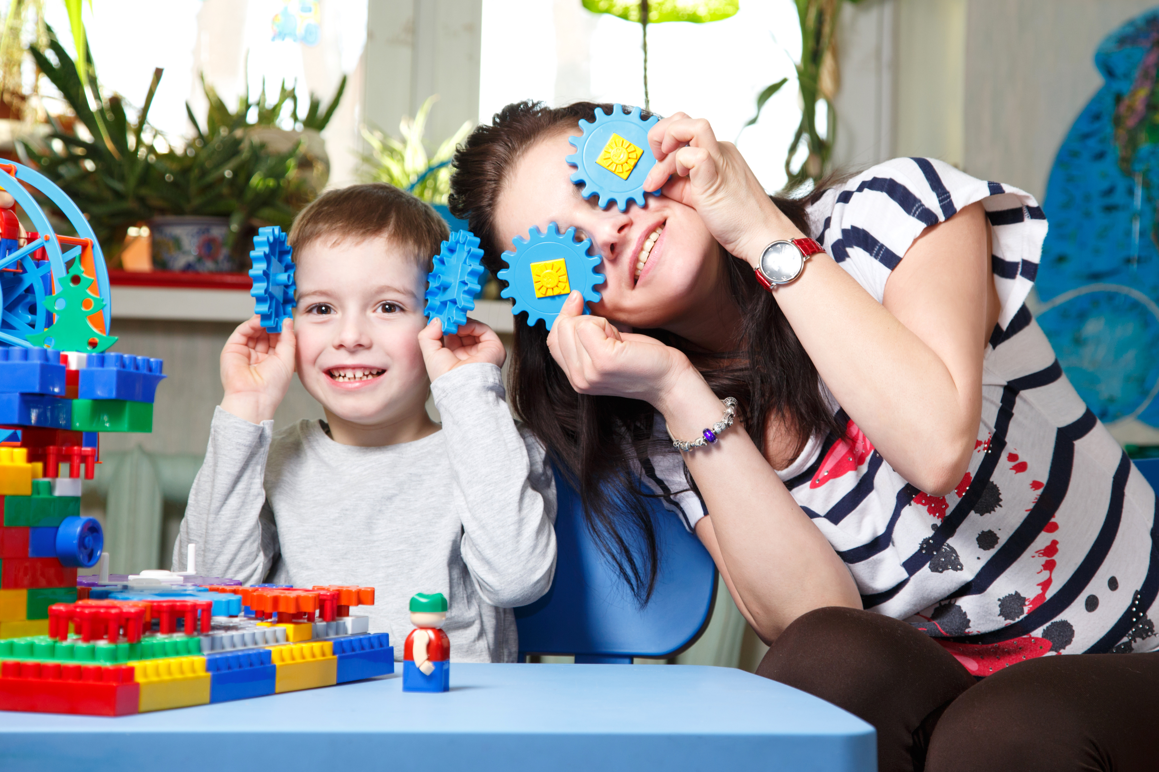 therapist and child playing